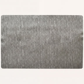 Set of 4 and 8 woven PVC placemats in gold and brown with a textured design, perfect for protecting tabletops.