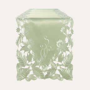 Linen table runner with elegant European embroidery, decorative table linen by FL3153-RN for a sophisticated dining setting.