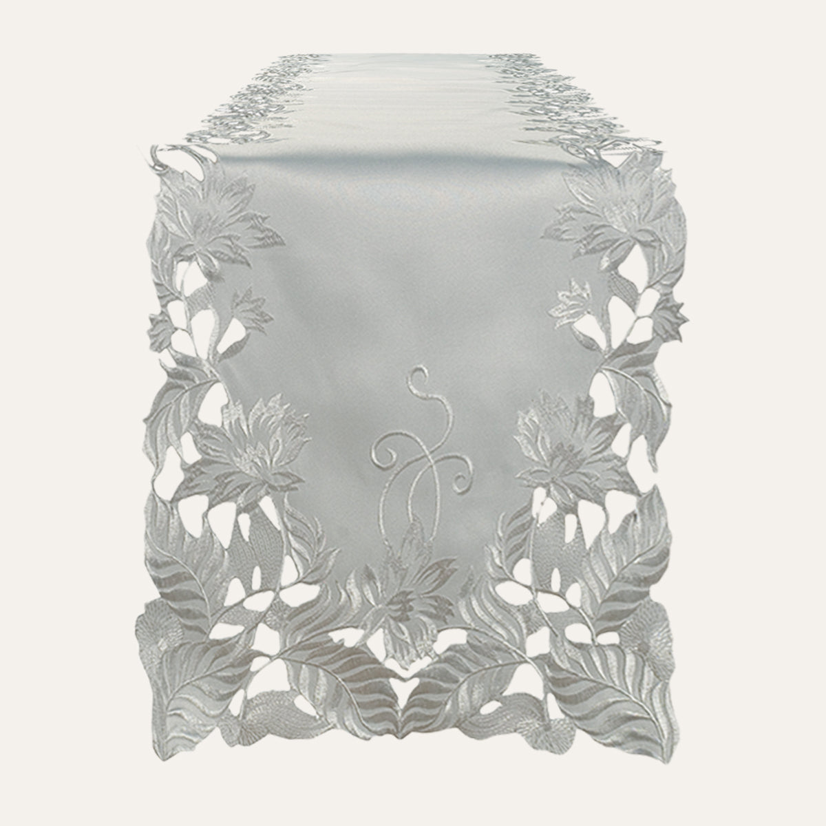 Linen table runner with intricate European embroidery from The Corda Collection, showcasing elegant craftsmanship and detailed design.