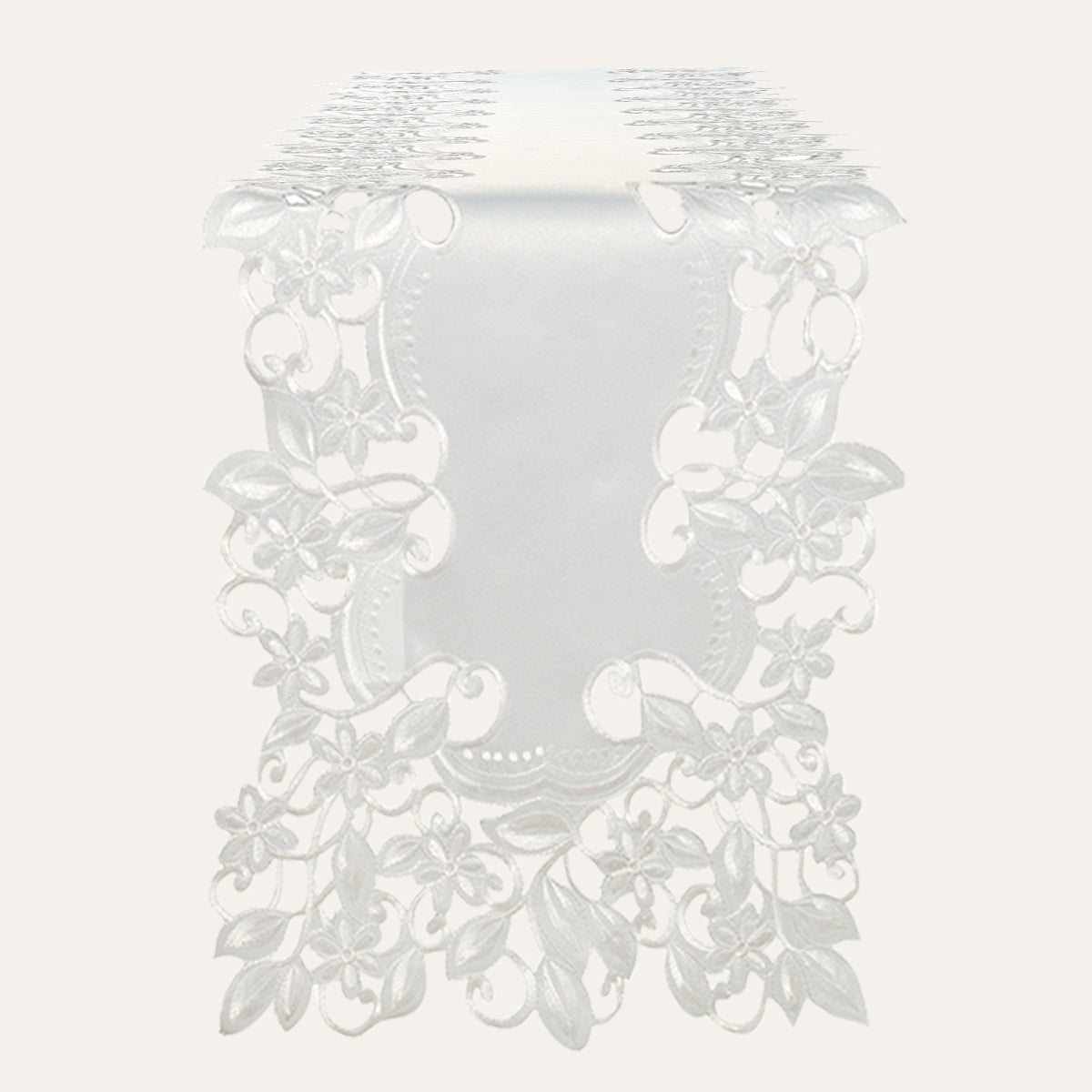 Linen table runner with intricate European embroidery from The Darvin Collection, featuring elegant floral patterns.