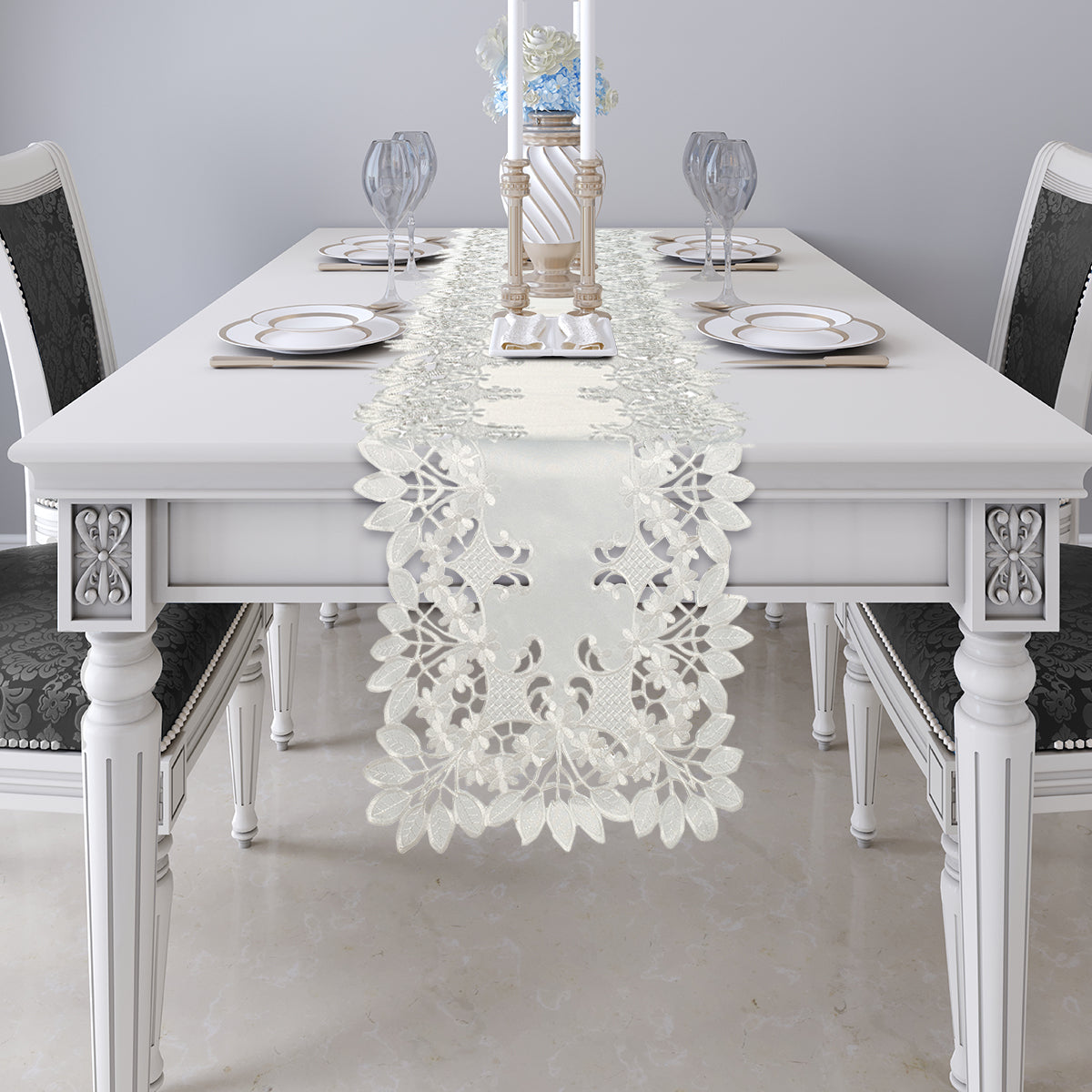 Linen table runner with intricate European embroidery from The Deandra Collection, featuring detailed craftsmanship and elegant design.