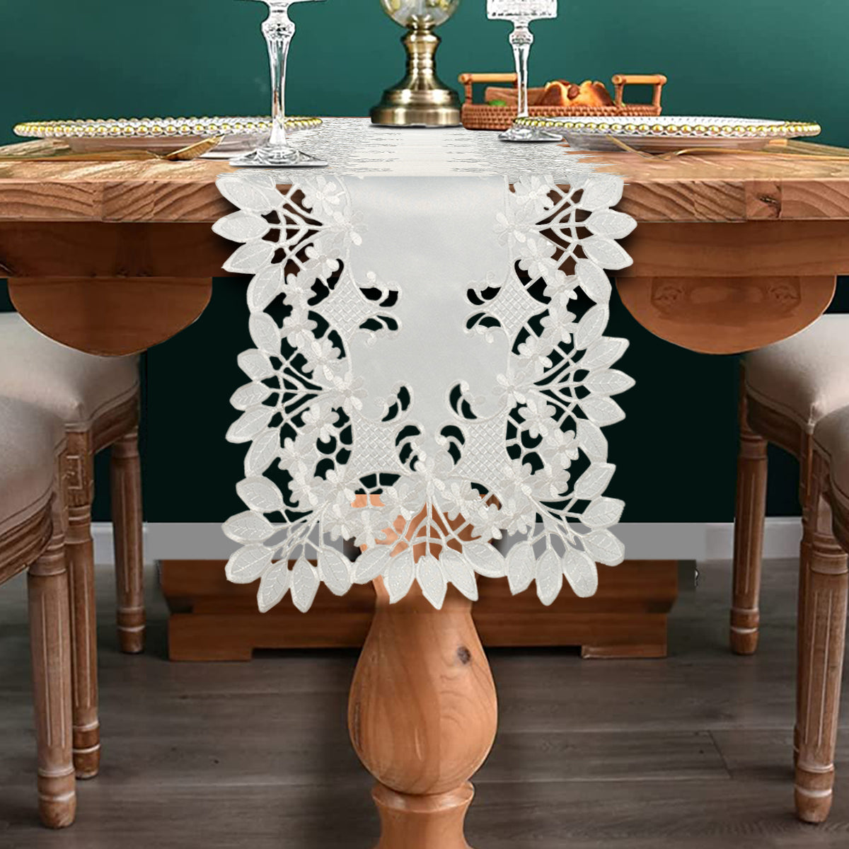 Linen table runner with intricate European embroidery from The Deandra Collection, featuring elegant floral patterns.