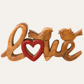 Hand-carved wooden sculpture titled Amber Affection by LAY016, a handmade decorative wooden décor piece for home art.