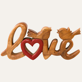 Hand-carved wooden sculpture titled Amber Affection by LAY016, a handmade decorative wooden décor piece for home art.