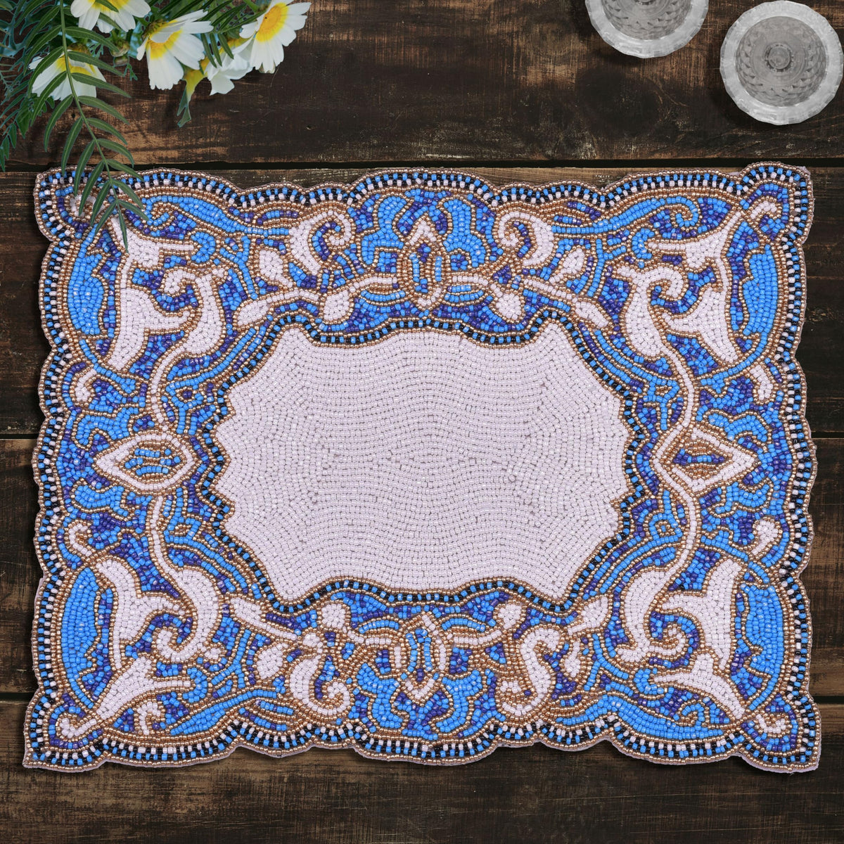Set of two Azure Glow beaded placemats in blue and white, embroidered, heat-resistant, 12x16 inch, artistic dining table décor.