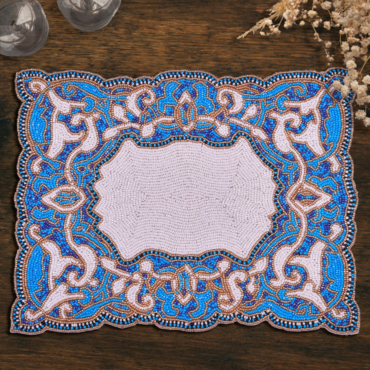Set of two Azure Glow beaded placemats in blue and white, embroidered, heat-resistant, 12x16 inch artistic dining table décor.