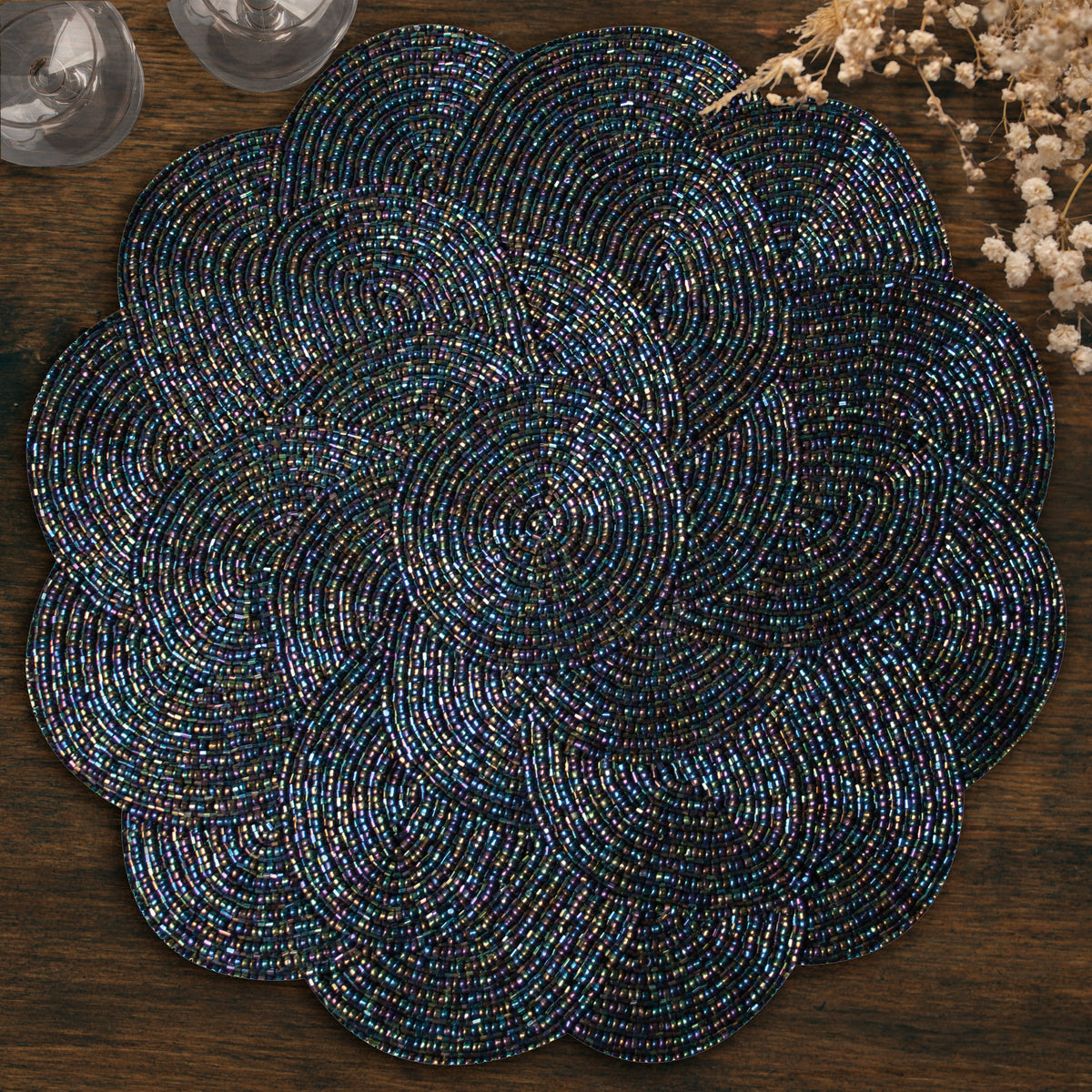 Embroidered beaded placemats from The Meribelle collection, featuring intricate beadwork and elegant design for table decor.