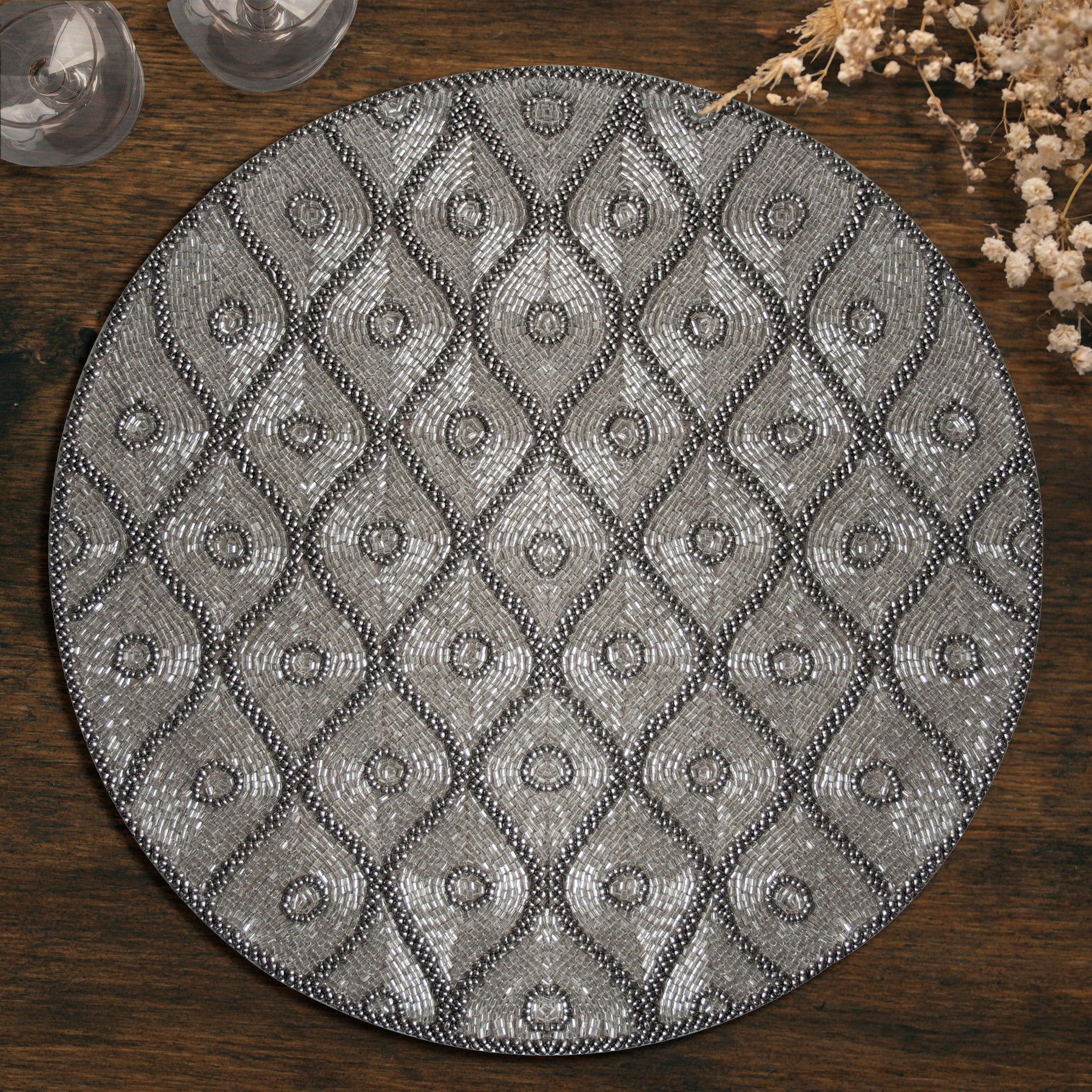 Embroidered beaded placemats featuring intricate beadwork and embroidery, ideal for elegant table settings.