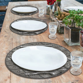 Embroidered beaded placemat from the Alvina collection, featuring intricate beadwork and embroidery for elegant table settings.