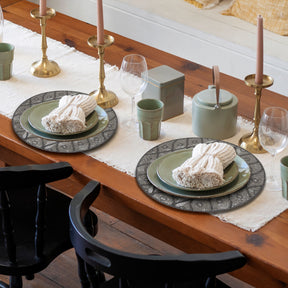 Embroidered beaded placemats from the Alvina collection, decorative tableware for elegant dining, featuring intricate beadwork and embroidery.