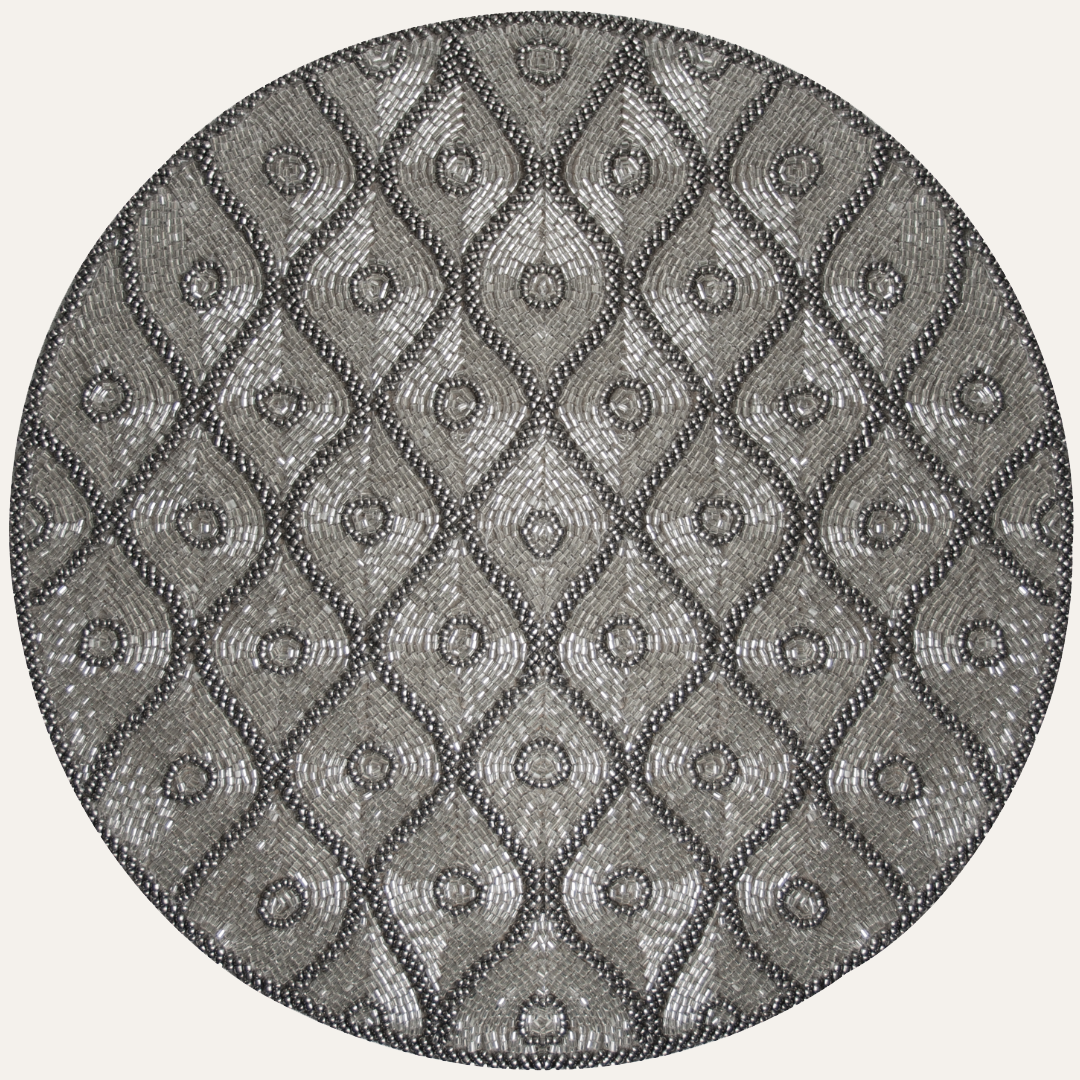 Set of embroidered beaded placemats featuring intricate beadwork and embroidery, ideal for elegant table settings.