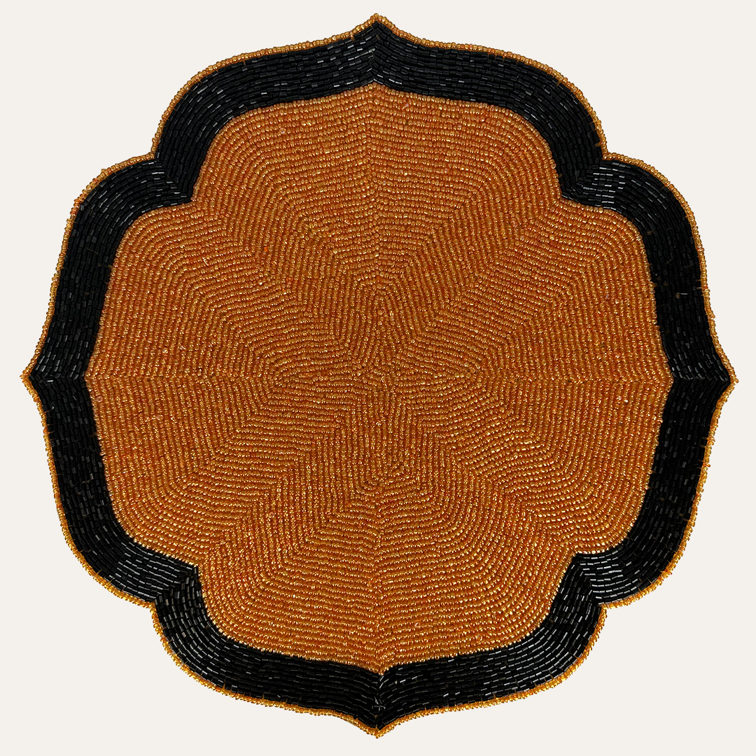 Set of 2 Amber Noir beaded placemats with embroidered design in warm copper and black, heat-resistant 14-inch table décor.