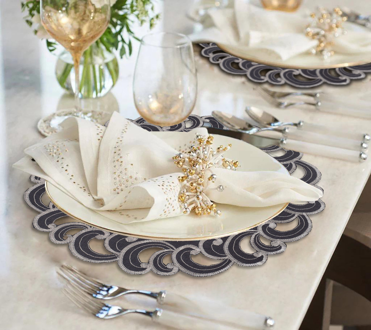 Set of four RIZ Aurora Charm 15-inch round doilies, elegant decorative placemats for dining and events, featuring intricate patterns.