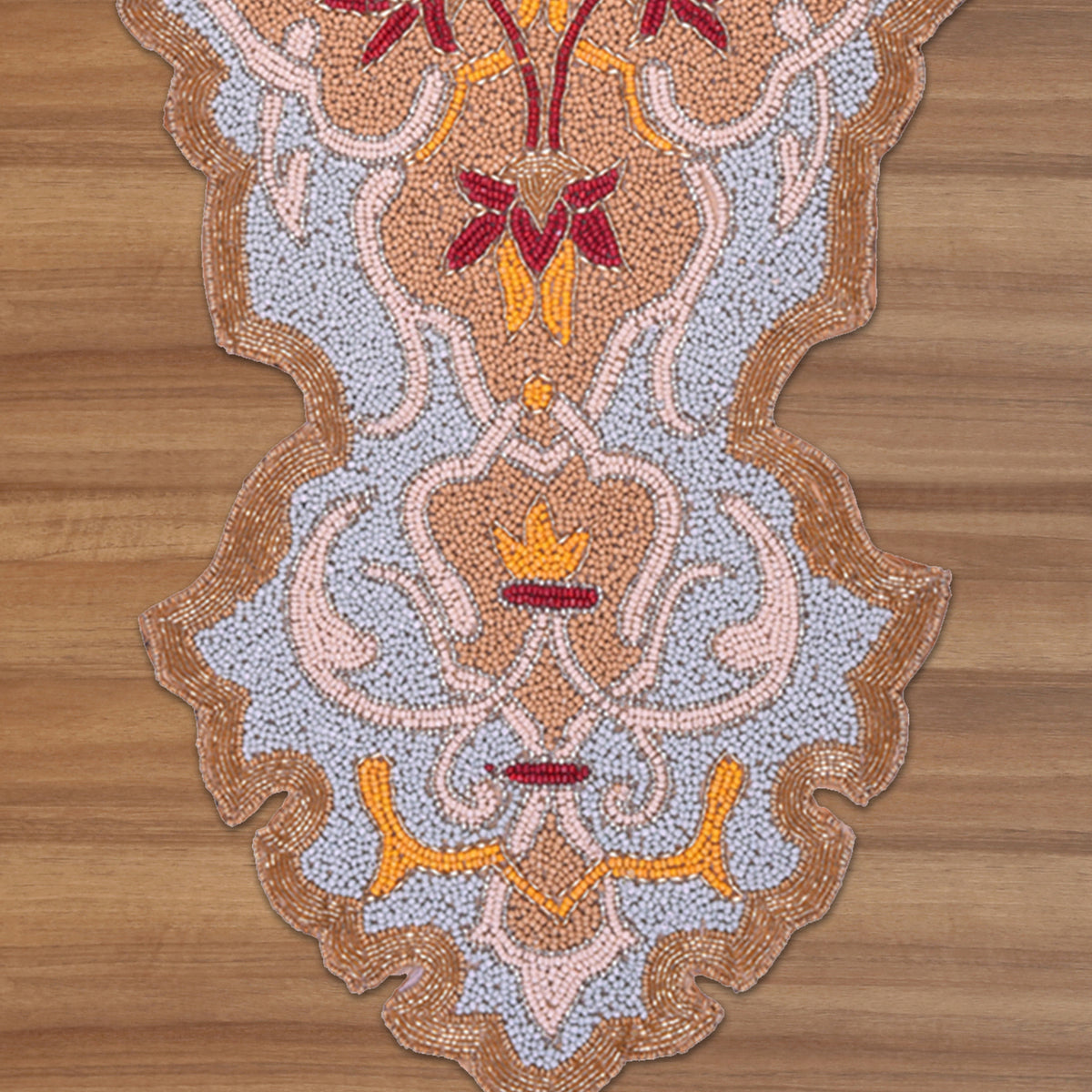 Beaded table runner by RNR 00009, showcasing intricate beaded design on fabric for elegant table decoration.