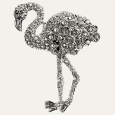 Set of four silver flamingo-shaped napkin rings from ZWZ-19-099 Tropical Charm collection, decorative dining table accents.