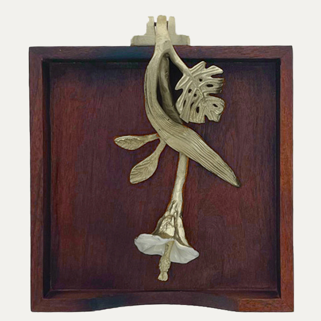Solid wood napkin holder with gold finish ornament, stylish napkin dispenser for elegant table settings.