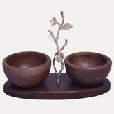 Two small acacia wood nut bowls for kitchen decor, featuring natural wood grain and a smooth, polished finish.