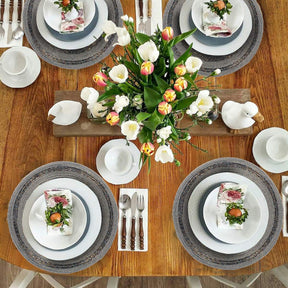 Set of four Vaiga Grace beaded placemats from The Vaiga Collection, elegant 14-inch decorative dining table décor.