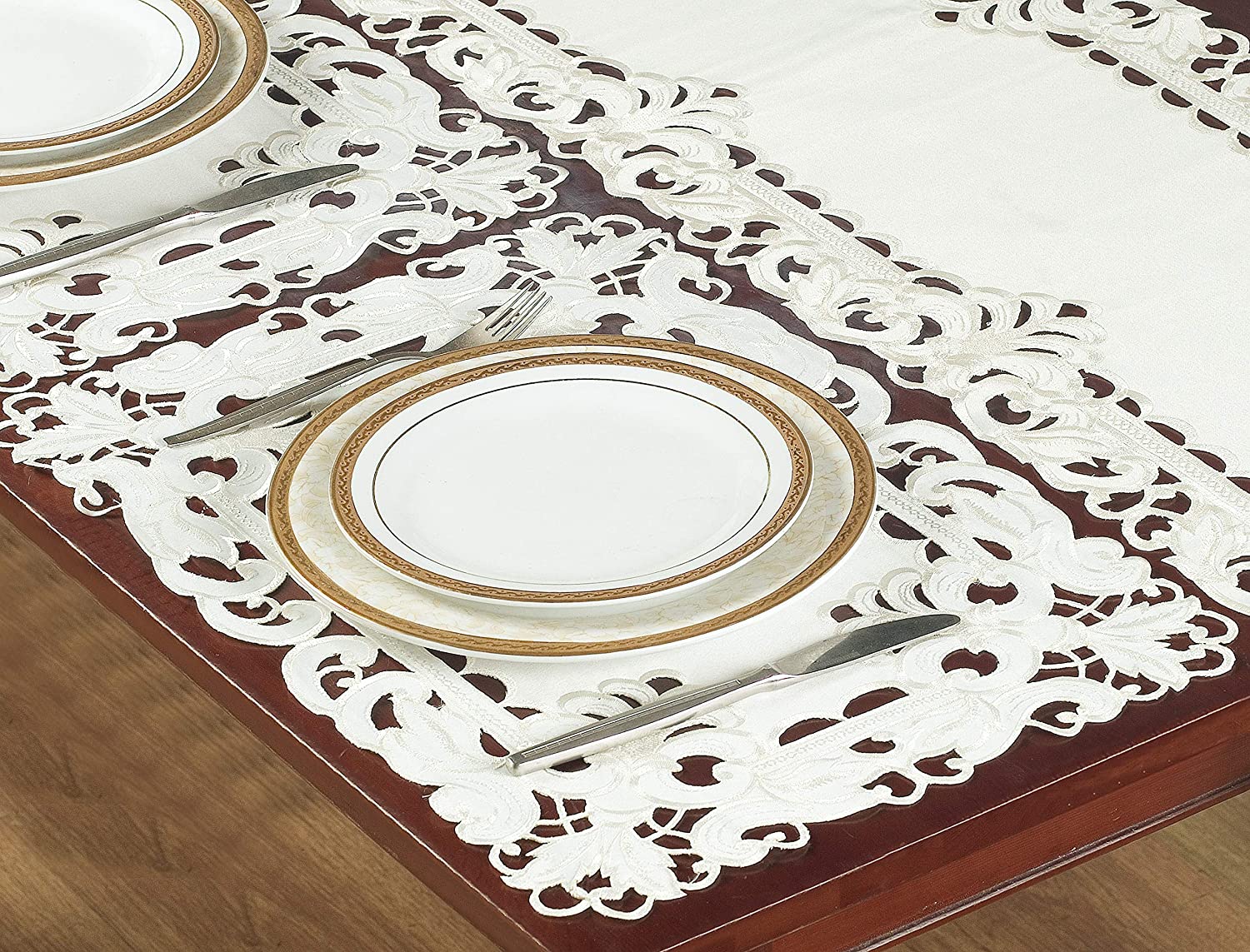 Set of six linen placemats with European embroidery from The Damarcus Collection, featuring intricate design and elegant craftsmanship.