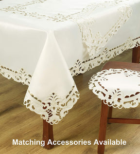 Set of six linen placemats with intricate European embroidery from the Damarcus Collection, perfect for elegant table settings.