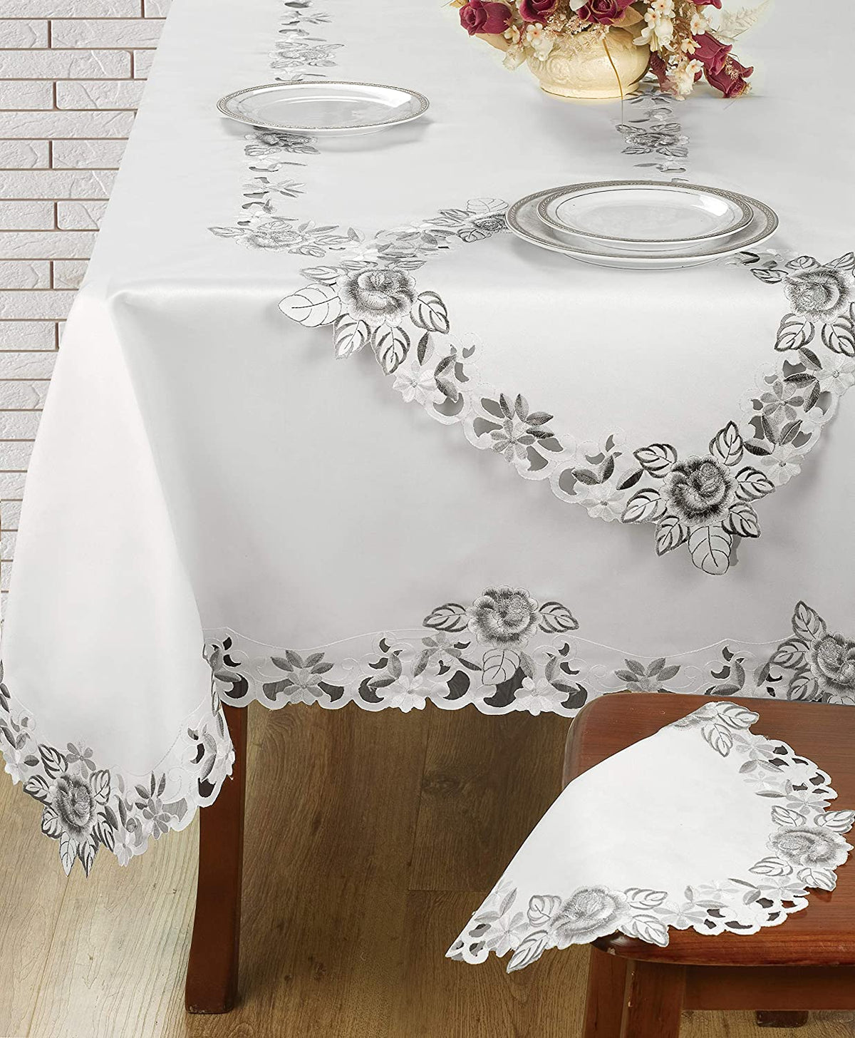 Set of six linen placemats with European embroidery from the Alois Collection, showcasing detailed craftsmanship and elegant design.