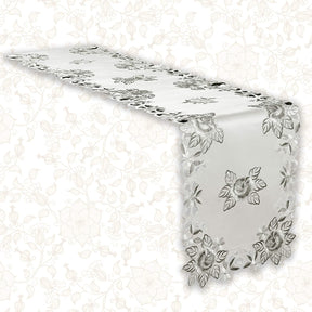 Linen table runner with intricate European embroidery, stylish design, perfect for elegant dining tables.