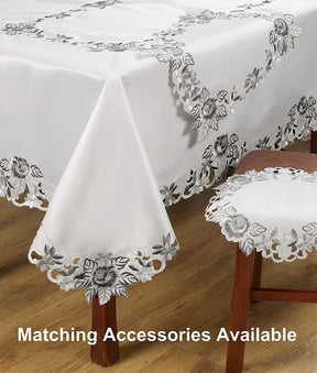 Linen table runner with intricate European embroidery, made by FD4151-RN, showcasing detailed craftsmanship on a stylish table setting.