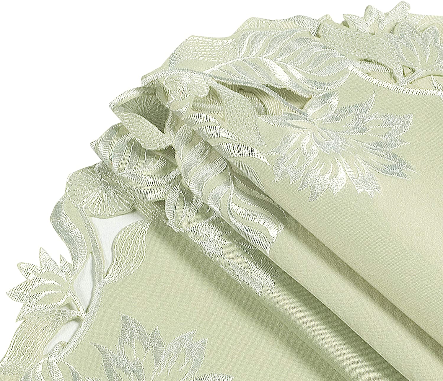 Set of four light green round linen doilies from The Daulton Collection, decorative placemats and doilies for table settings.