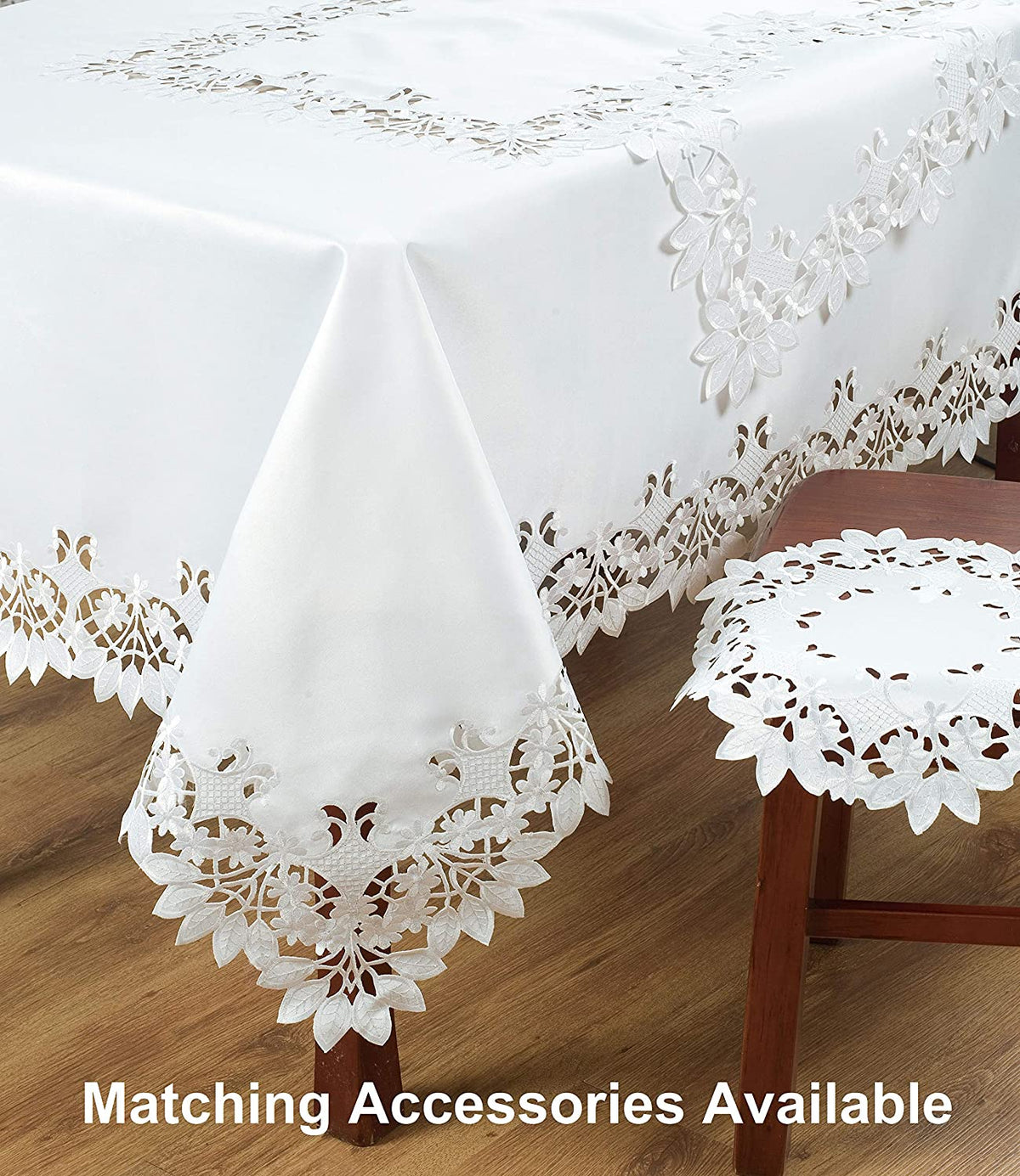 Linen table runner with intricate European embroidery from The Deandra Collection, showcasing detailed woven floral patterns.