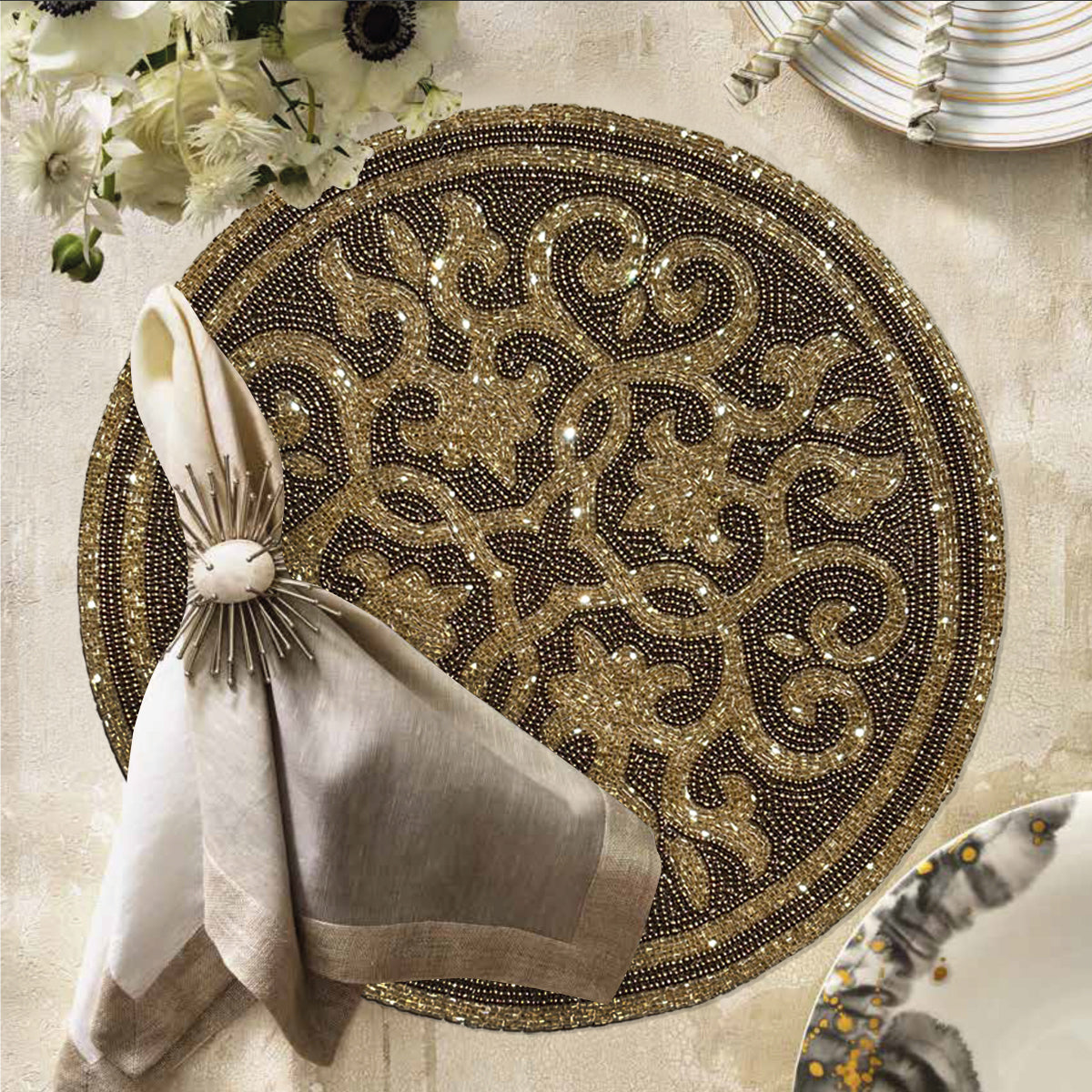Set of 2 festive embroidered beaded placemats featuring poinsettia design, ideal for holiday table decor.