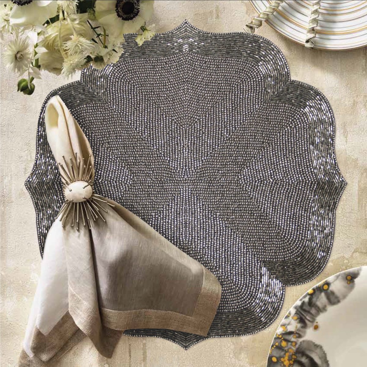 Set of 2 embroidered beaded placemats with festive poinsettia design, ideal for holiday table decor from TD-BPM-PCV1.