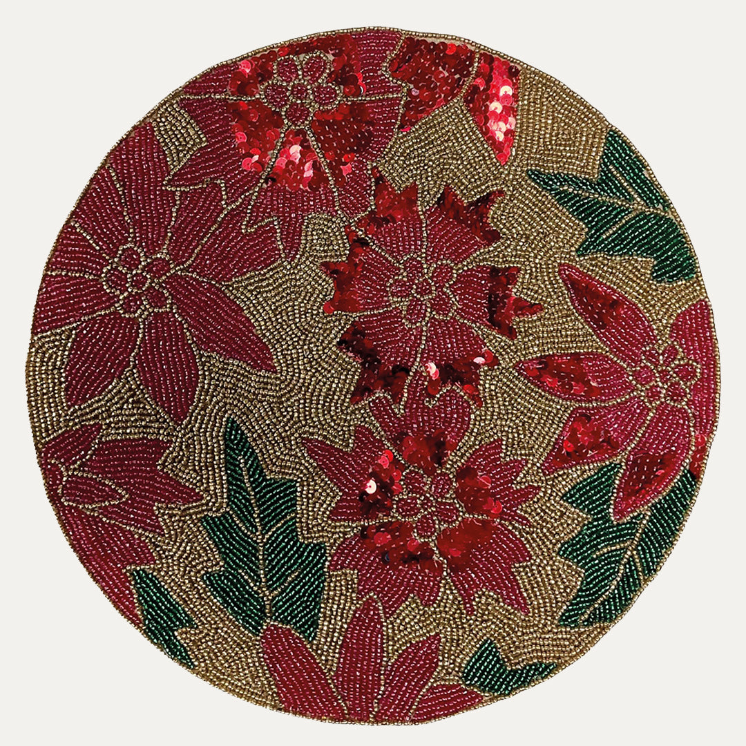 Set of 2 embroidered beaded placemats with festive poinsettia design, perfect for holiday table decor.